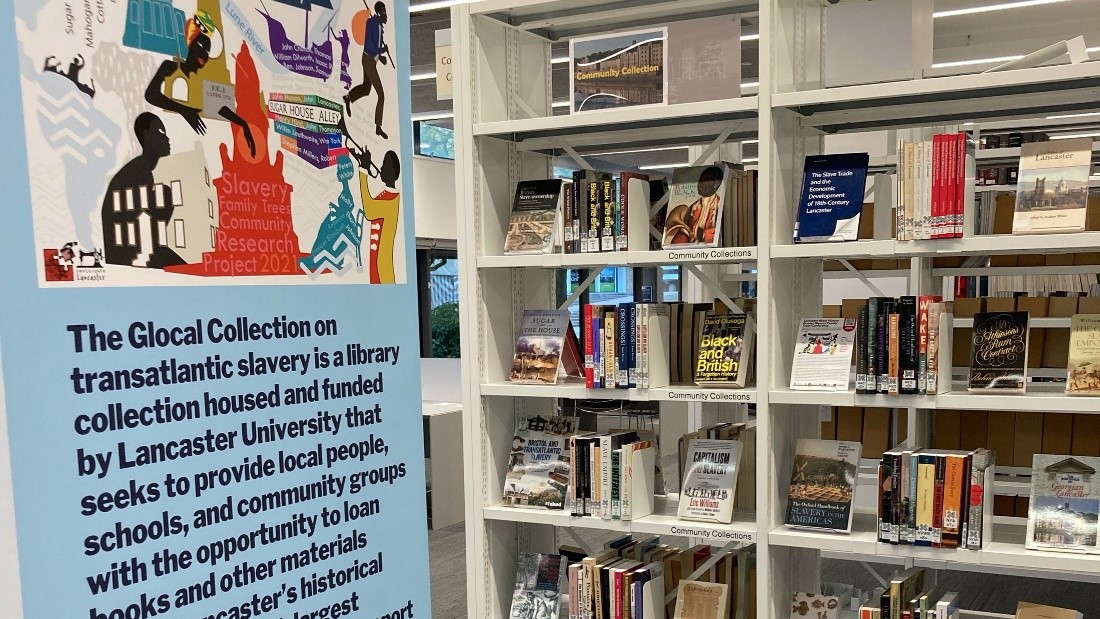 Black history poster and books in the Library