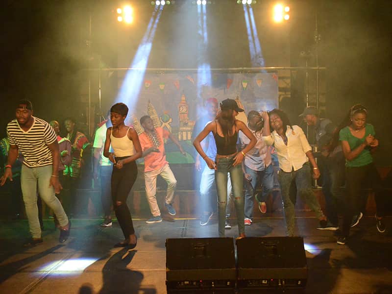 Global Summer School students dancing on stage