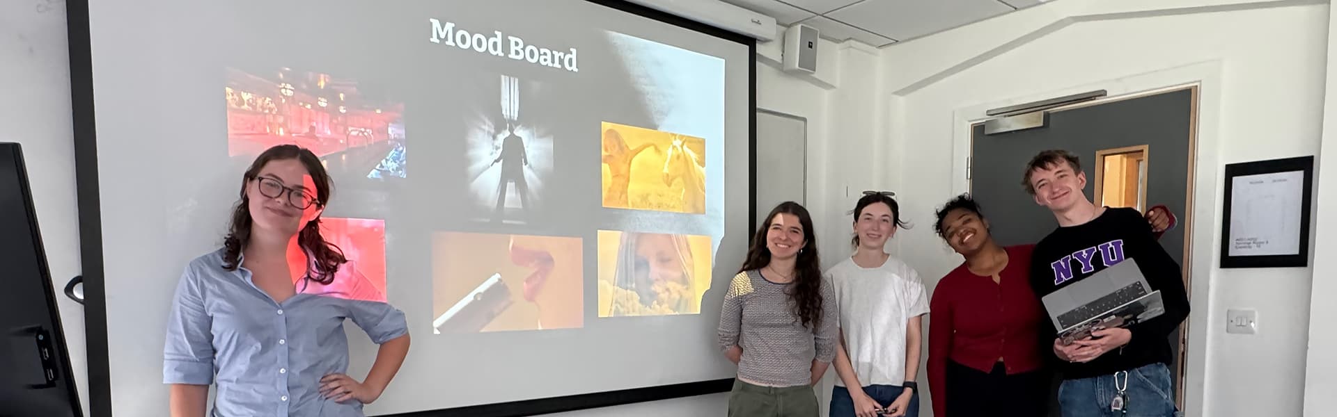 Five students students presenting their project mood board during the Film Summer School