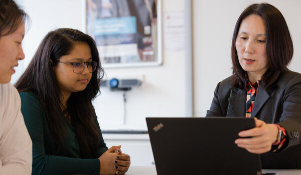 Career coach and a pair of students