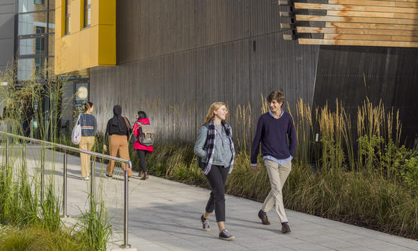 Students walking outside a lecture theatre 