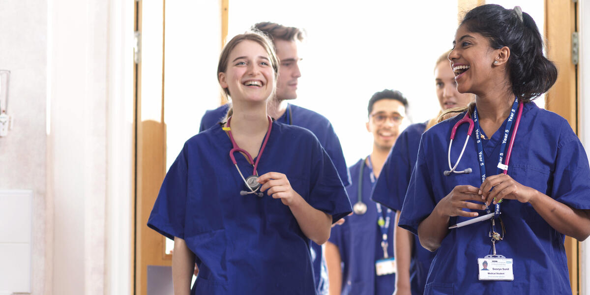 Medical students laughing together