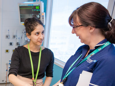 Student talking to a nurse