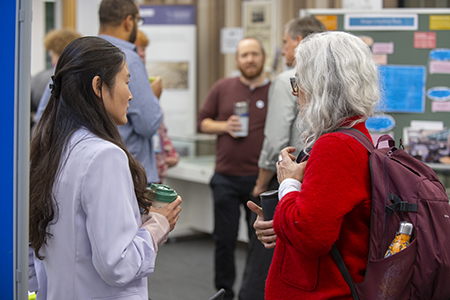 Researchers talking to each other at the Research Culture Day 