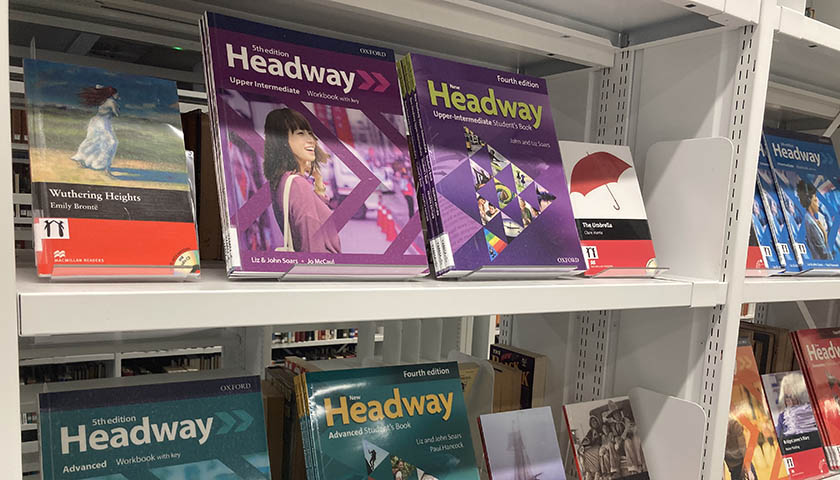 Sanctuary collection books on bookshelves in the Library