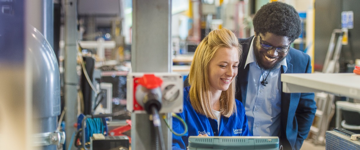 Two people in a laboratory in the Engineering Building.