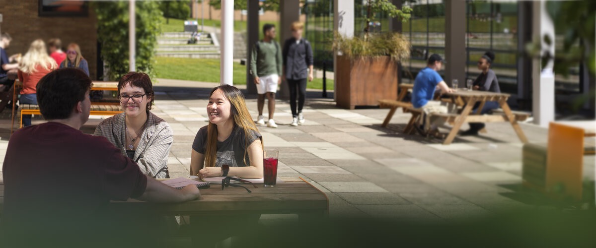 Students congregate in the square by Fylde Bar.