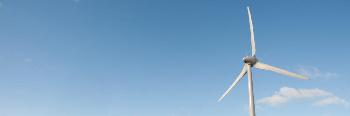 The Lancaster University wind turbine, photographed against a clear blue winter sky