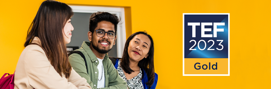 Three people are looking at each other and smiling. The TEF 2023 Gold award logo is displayed on the right of the image.